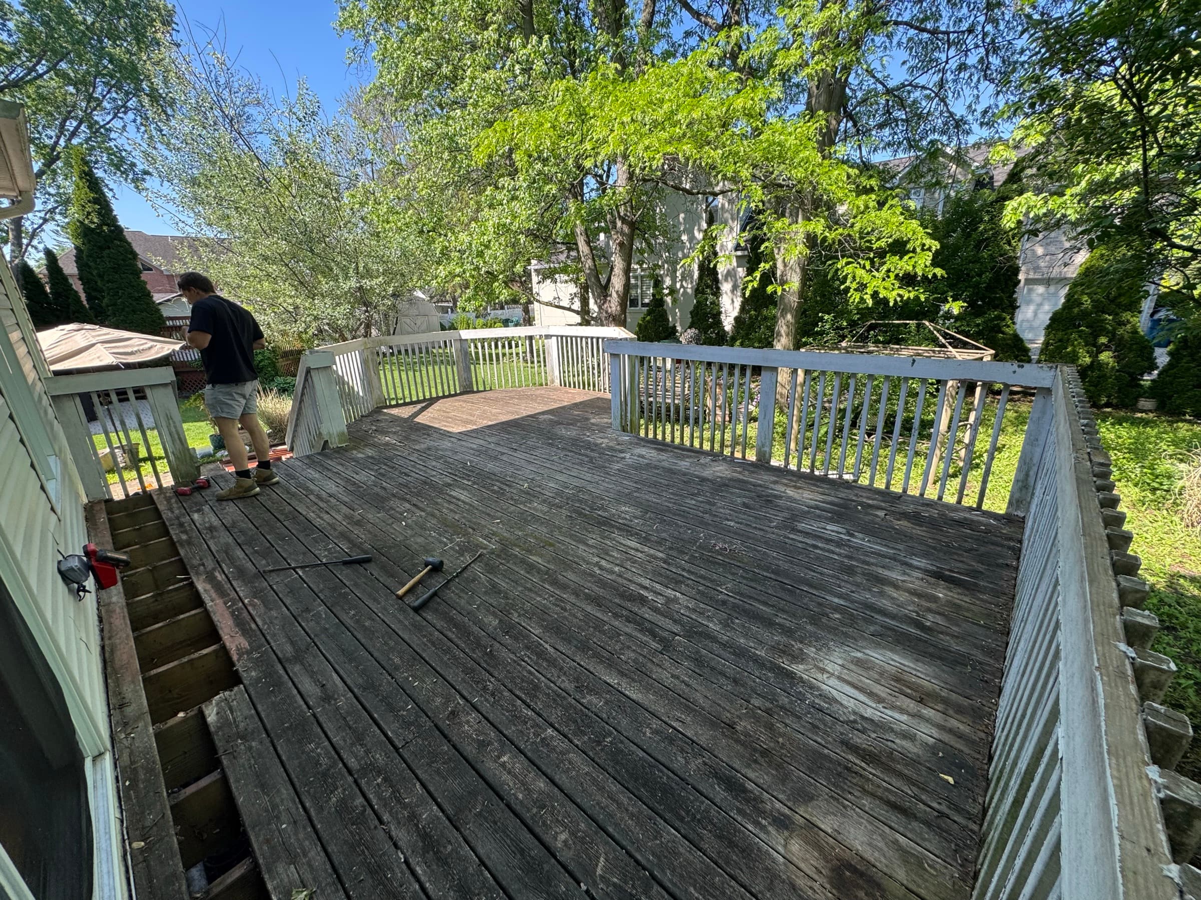 Weathered grey deck before work began